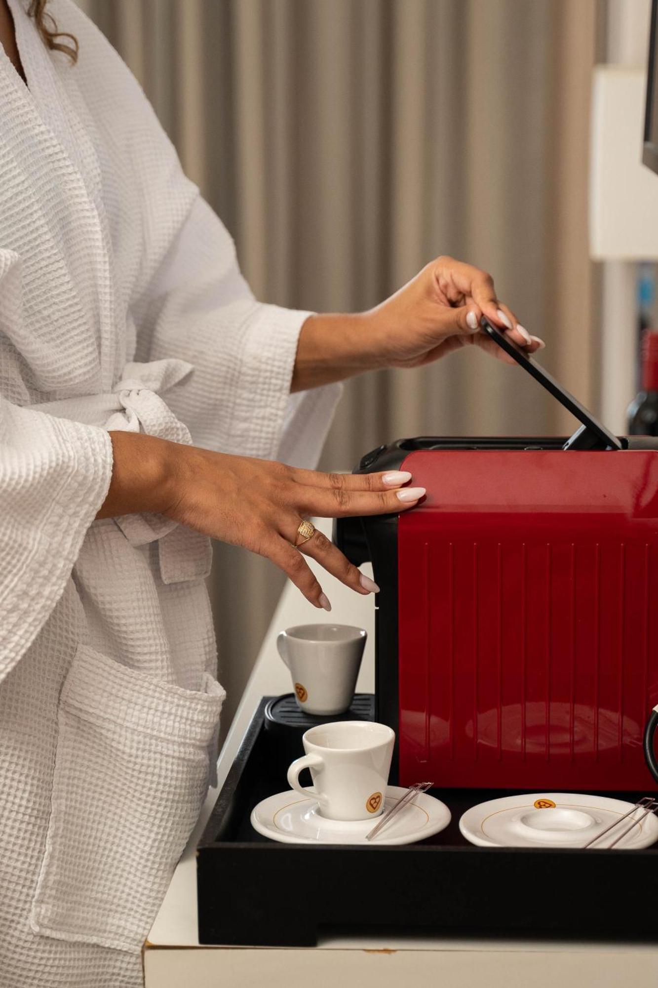 Radisson Rio De Janeiro Barra Hotel Luaran gambar A Nespresso machine